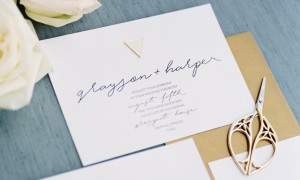 gold embelshed wedding invitations